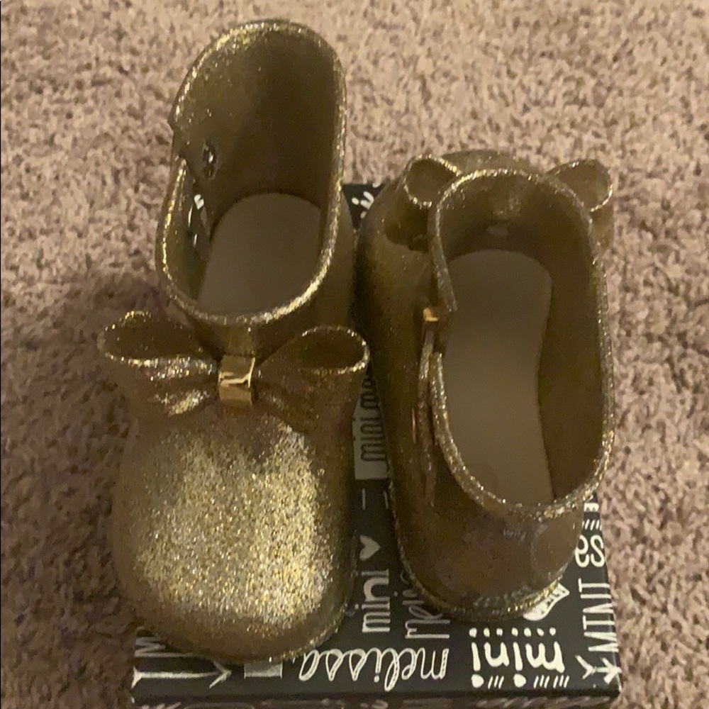Mini Melissa rain boots. Gold glitter, big bow